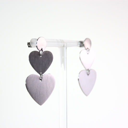 Statement vallende hartjes oorbellen