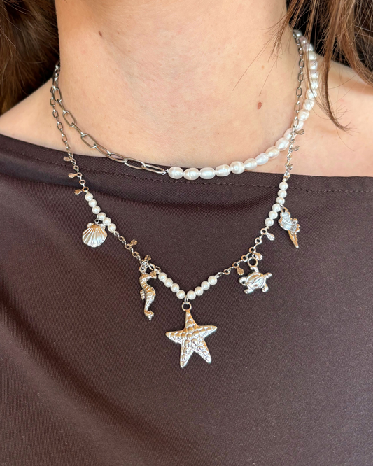 Bedelketting met zeedieren en parels