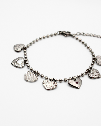 Bedelarmband met hartjes