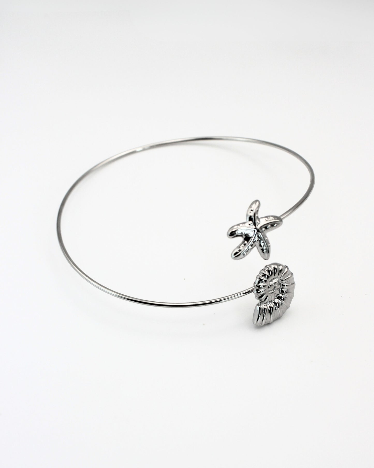 Schelpen armband bovenarm