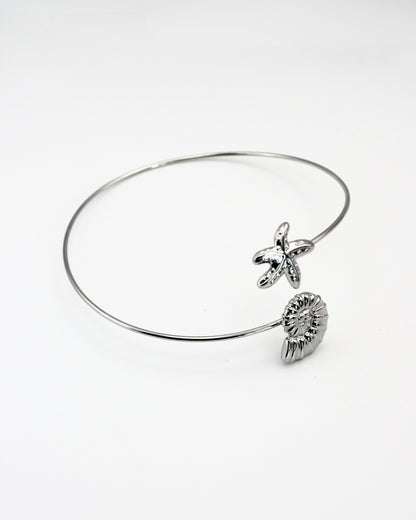Schelpen armband bovenarm