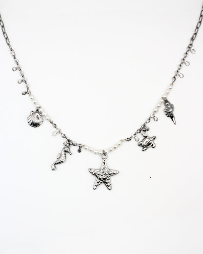 Bedelketting met zeedieren en parels