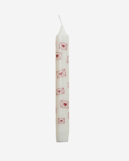 Witte kaars met enveloppen