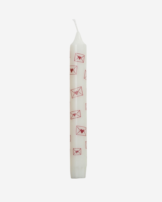 Witte kaars met enveloppen
