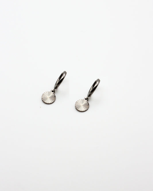 Oorbel munt met zonnestralen